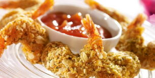 Mazzancolle croccanti alle erbe e cereali