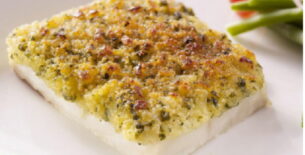 Porzione di pesce bianco in salsa Bordolese